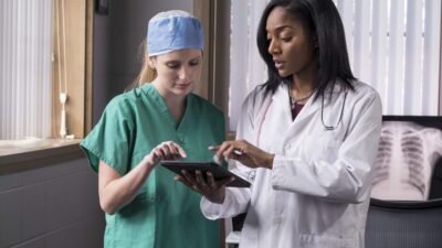 Doctor and nurse with iPad